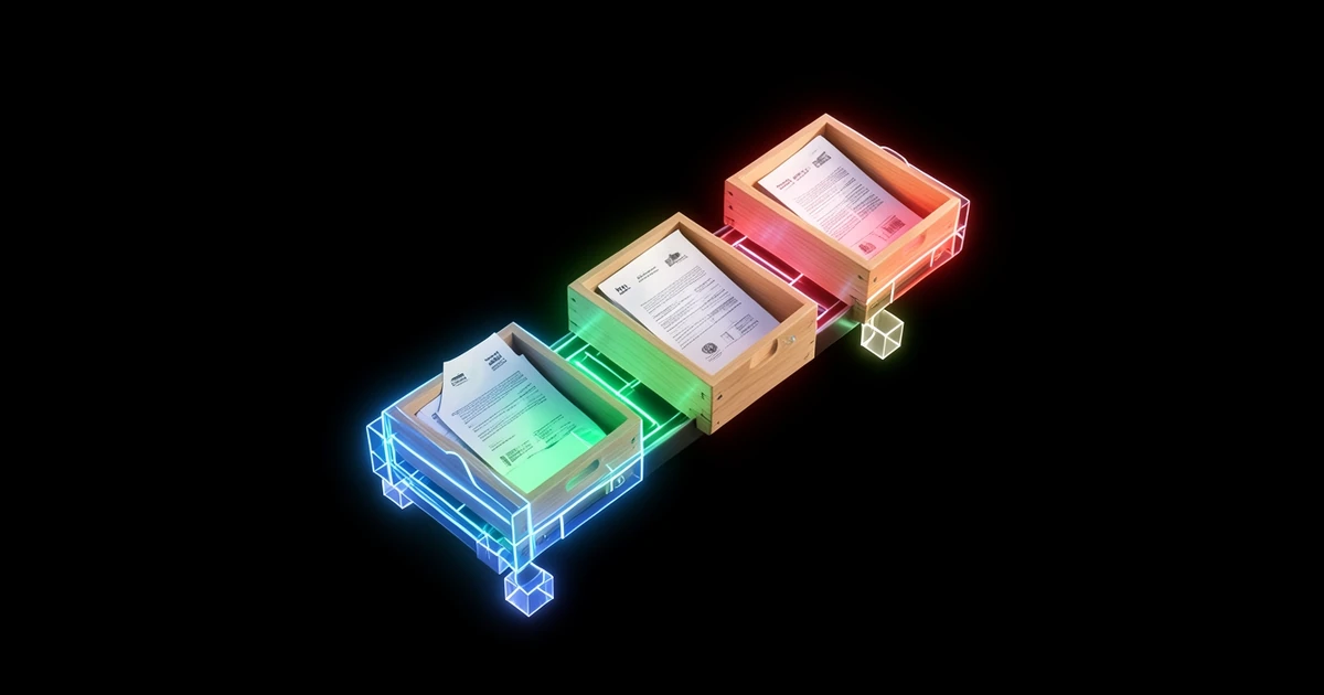 A small conveyor belt carries envelopes and paper invoices that drop neatly into three wooden trays.